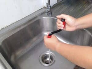 Flexible spring drain cleaner