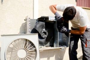 working on outdoor air conditioner